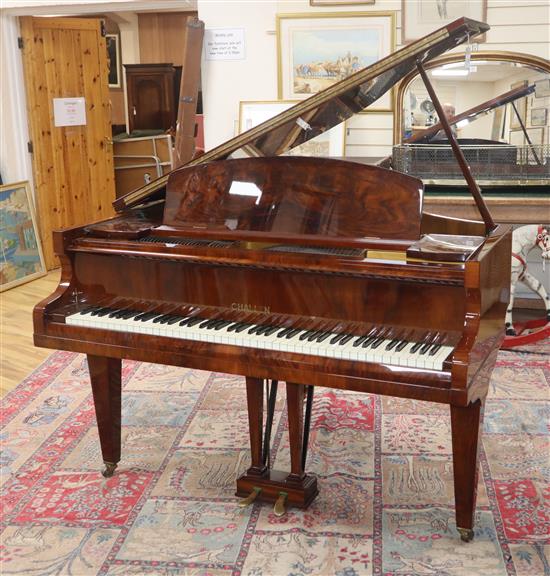 A modern walnut baby grand piano by Challen